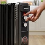 Radiateur rempli d'huile compacte 2500W avec 11 ailettes et contrôle du thermostat - noir – Image 3